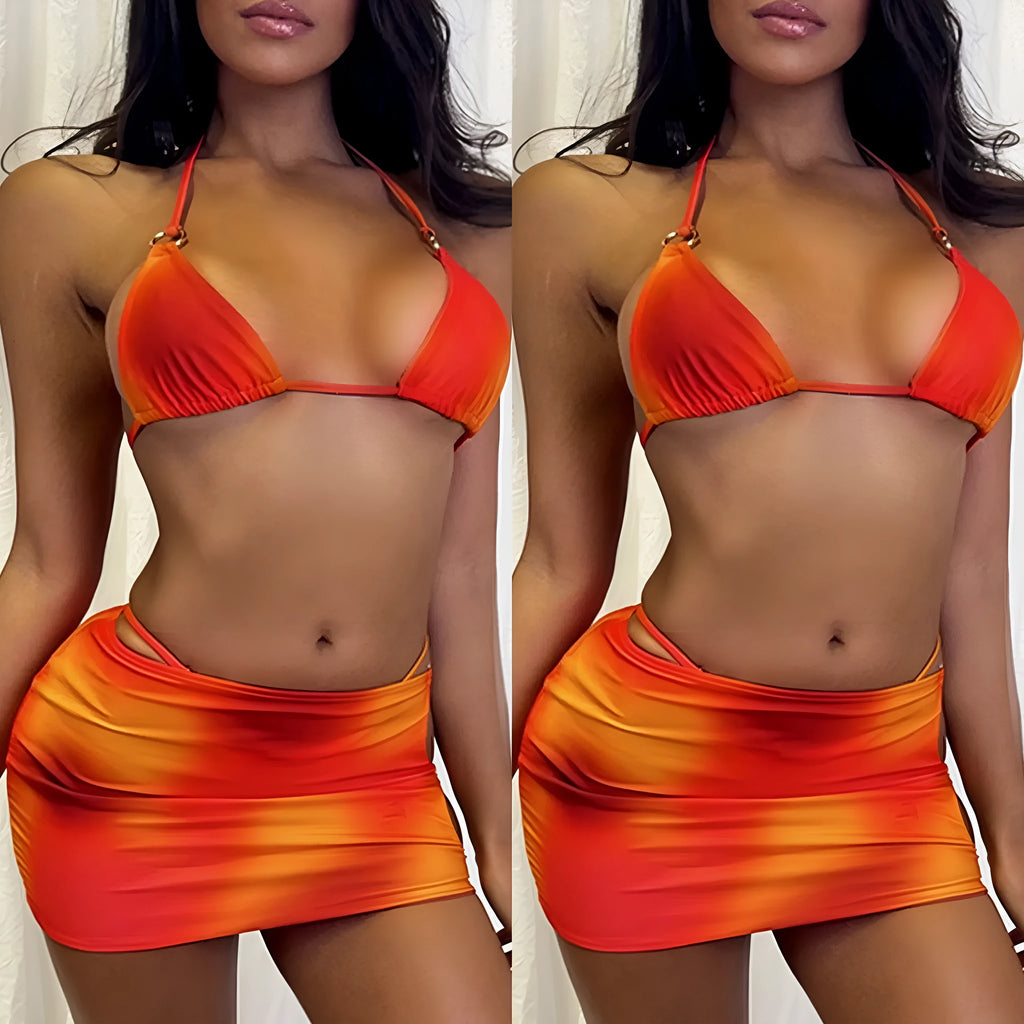 Tie-dye solid colour gradient three-piece halter-neck bikini set with skirt on a mannequin.