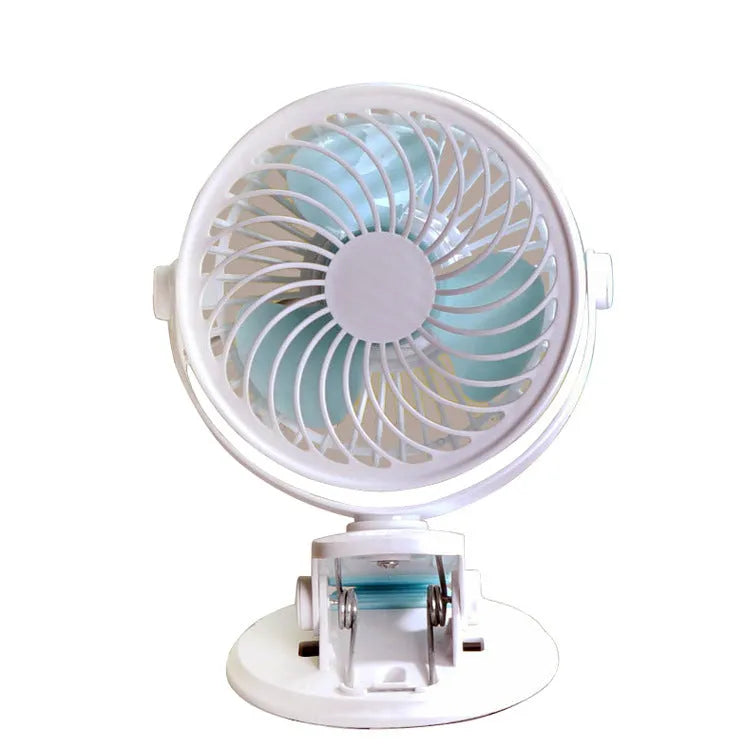 Compact USB desktop fan shown as both a clip-on model and a floor-standing model on a wooden desk.