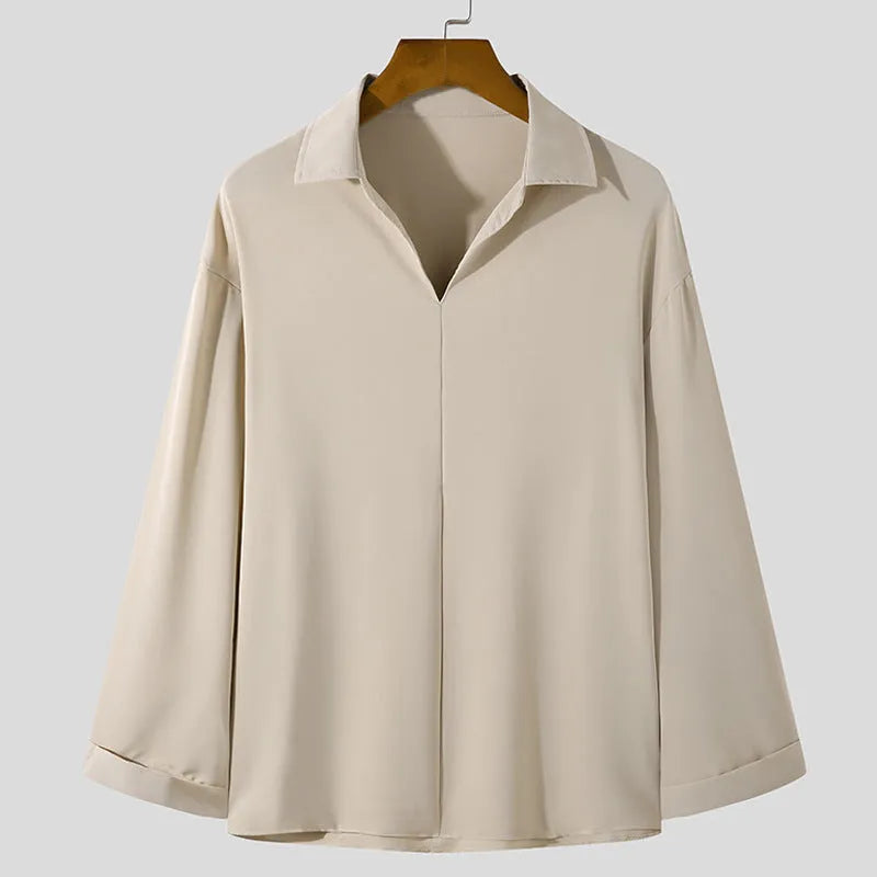 Men's loose fit lapel casual shirt in a solid colour with long sleeves.