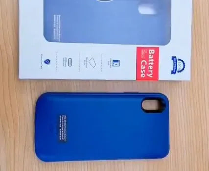 Shockproof silicone iPhone battery charger case shown in available colours: black, blue, pink, and white.