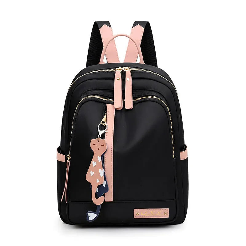 Women's black nylon casual backpack with waterproof construction and anti-theft compartments