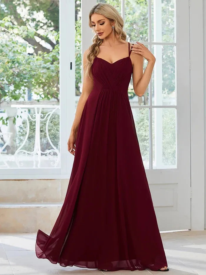 Women's sleeveless A-line long dress with pleated skirt in light green polyester fabric
