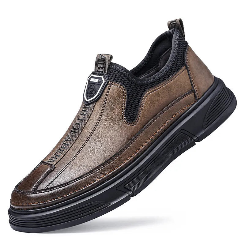 Men's black and brown solid colour leather casual shoes with round toe.