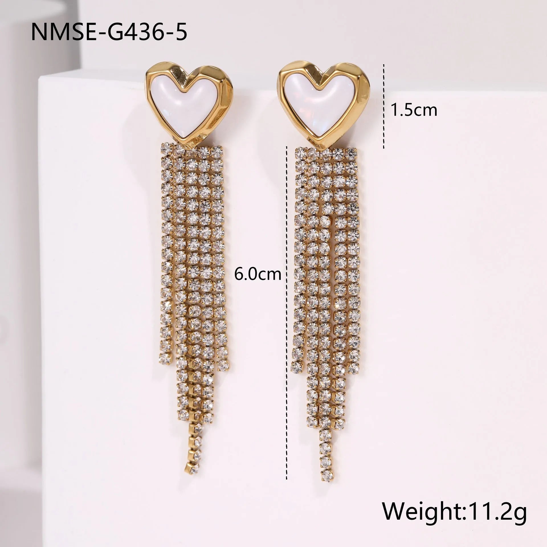 Women's stainless steel earrings with gold plated heart and star shapes in an irregular geometric design.