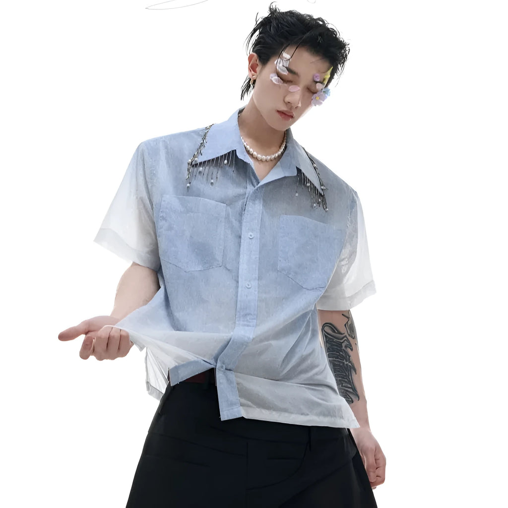 Men's solid blue loose fit short sleeve casual shirt on a hanger.
