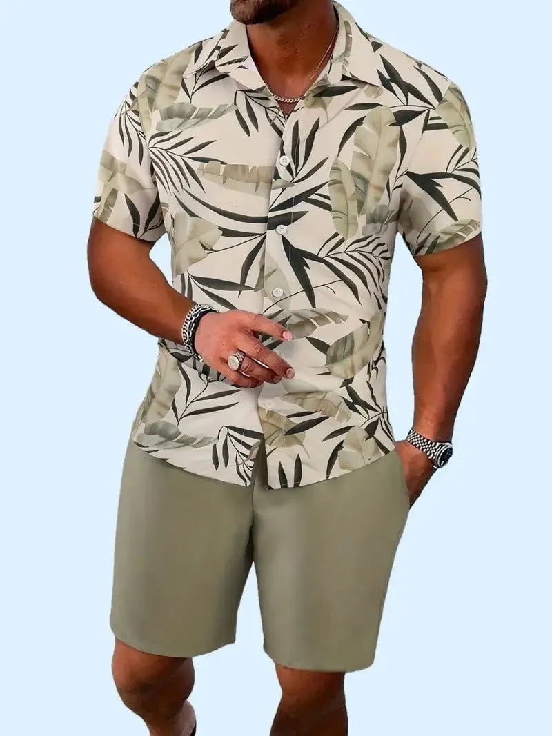 Man wearing a short sleeve Hawaiian print shirt and matching shorts, a casual polyester suit set.