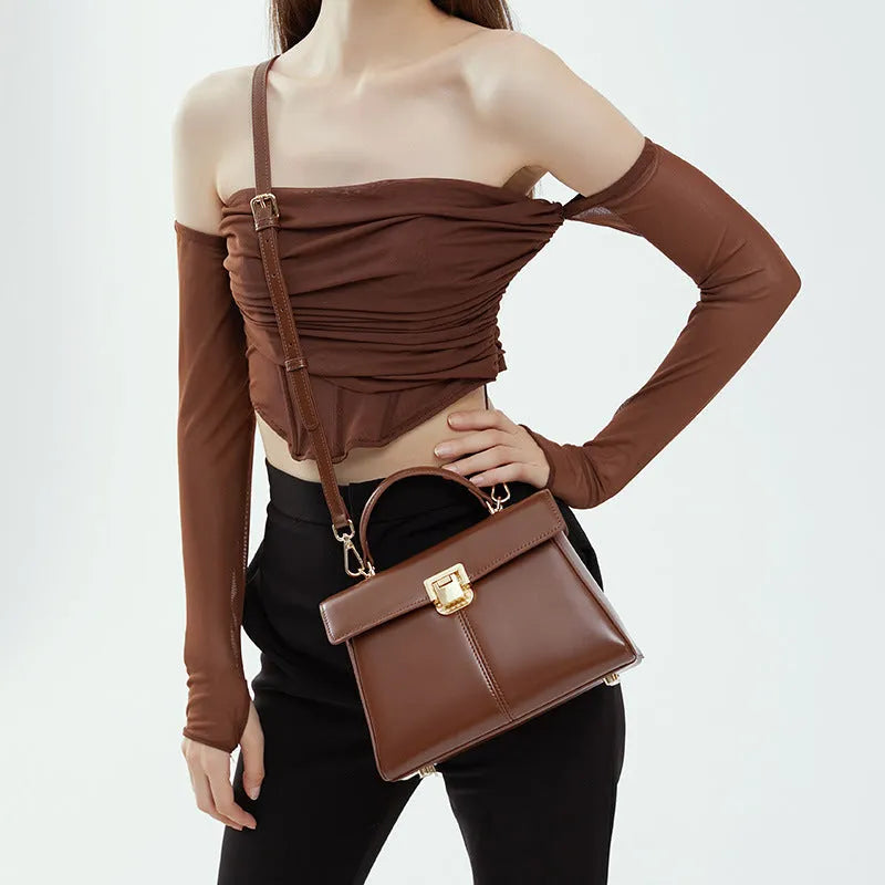 Women's black genuine leather shoulder bag with vachette clasp in horizontal square shape