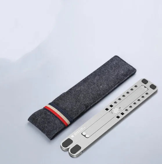 Foldable aluminium laptop stand in silver, shown open at an angle and folded flat.