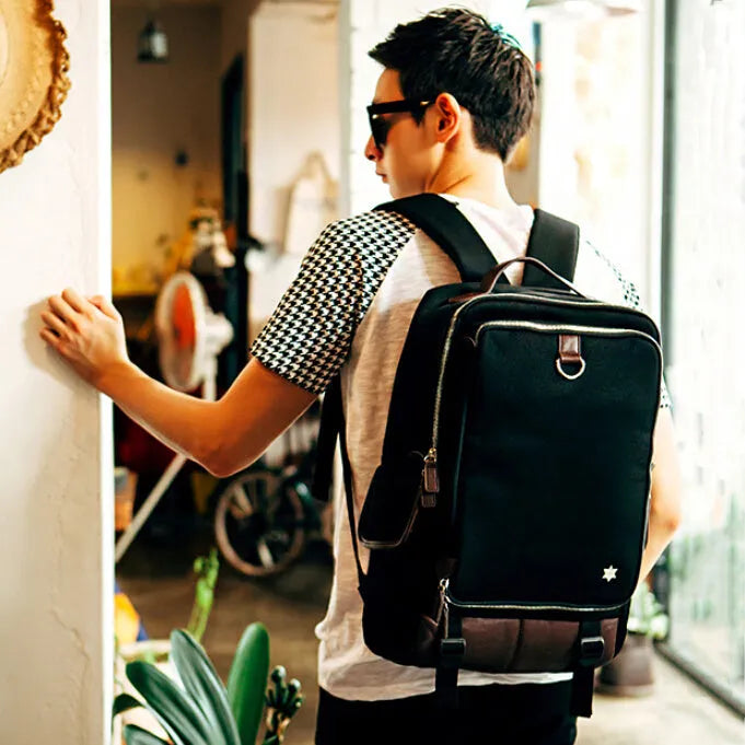 Men's Oxford cloth backpack with multiple compartments shown in Army Green colour
