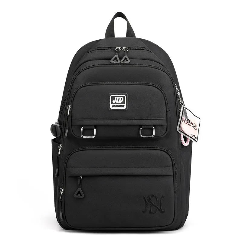 Girls large capacity nylon school backpack in purple with waterproof anti-theft features and breathable back panel