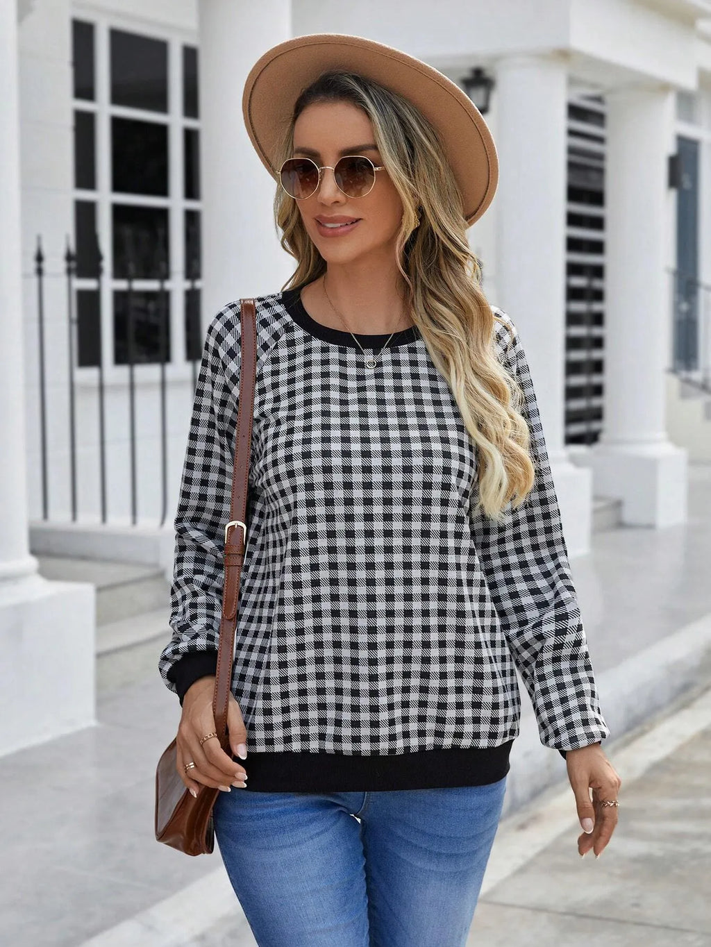 Black long sleeve pullover sweater with a Japanese sweet plaid striped pattern.