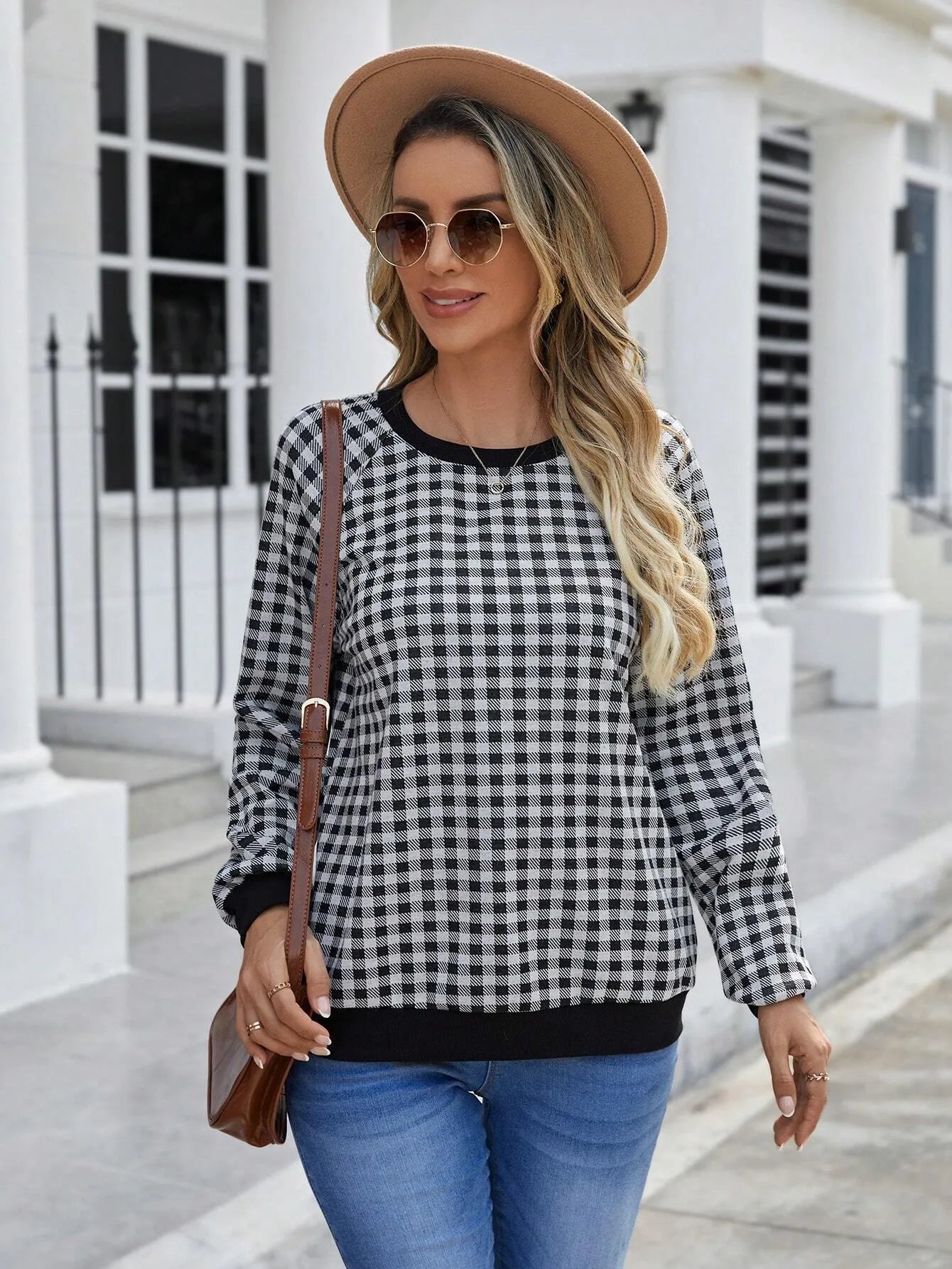 Black long sleeve pullover sweater with a Japanese sweet plaid striped pattern.
