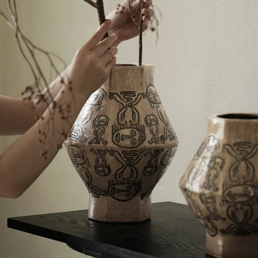 Hand-painted ceramic vase with tribal totem flower designs and vintage carved art patterns