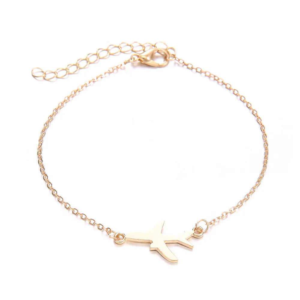 Three Bohemian-style bracelets with aircraft map charms and heart shapes in electroplated alloy