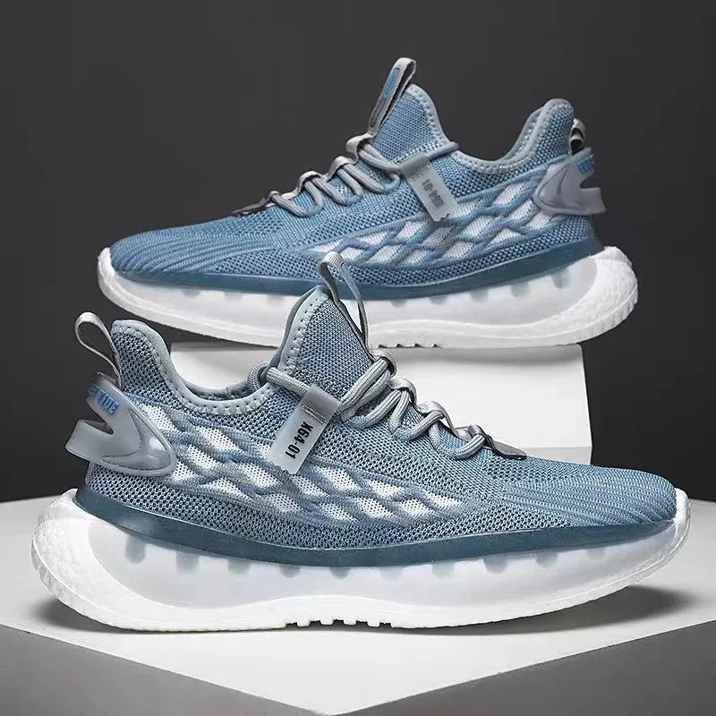 Men's white casual sneakers with woven mesh upper, platform rubber sole, and front lace-up closure.