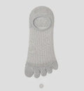 Pair of solid colour modal five-finger boat socks laid flat.