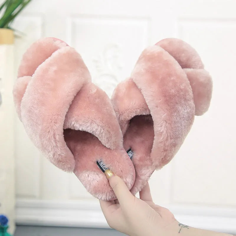 Cross open-toe fur slippers in pink with a patterned non-slip sole.