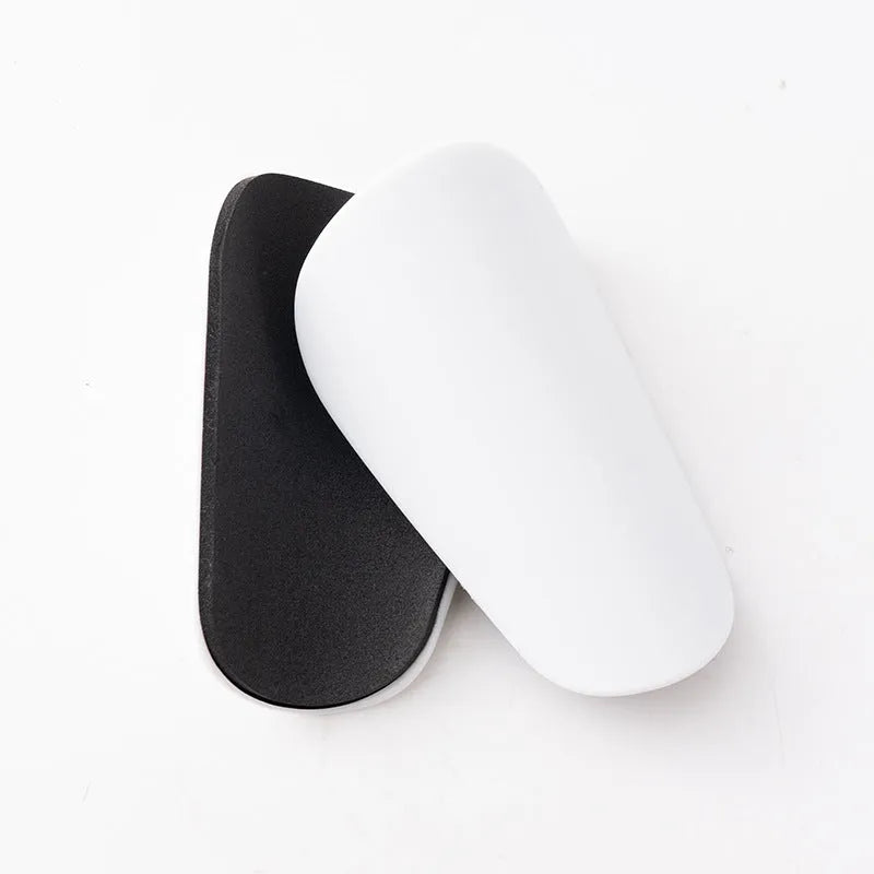 PU mini shin guards for football and sports in black, white, red, and blue colours.