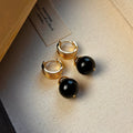 Gold-plated geometric earrings made from brown and black Tigereye stone in a French retro style.