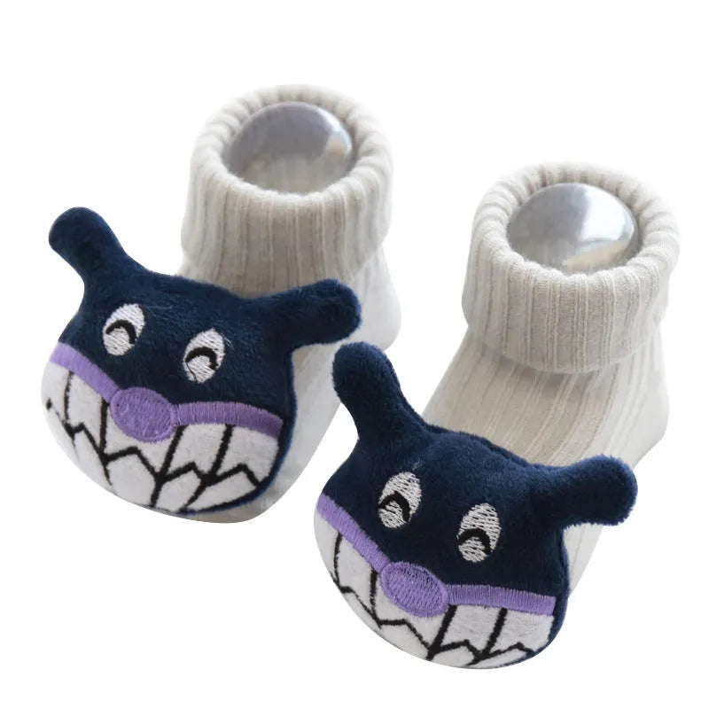 Cotton baby floor socks in various patterns including animal prints, stars, and bows for infants aged 0-3 months