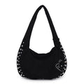 Soft plush women's tote handbag in retro style, carried underarm.
