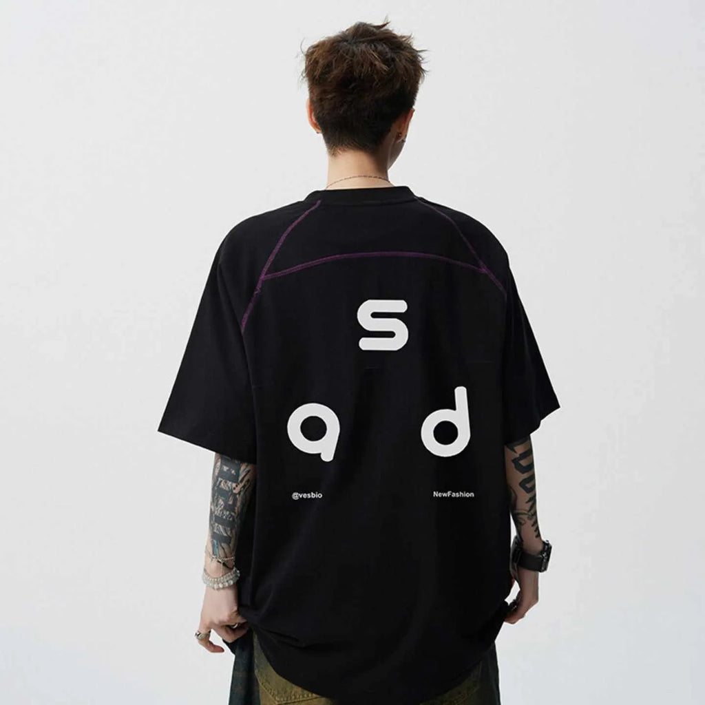 Men's loose fit black cotton t-shirt with a letter print on the front, short sleeves, and a round neck.
