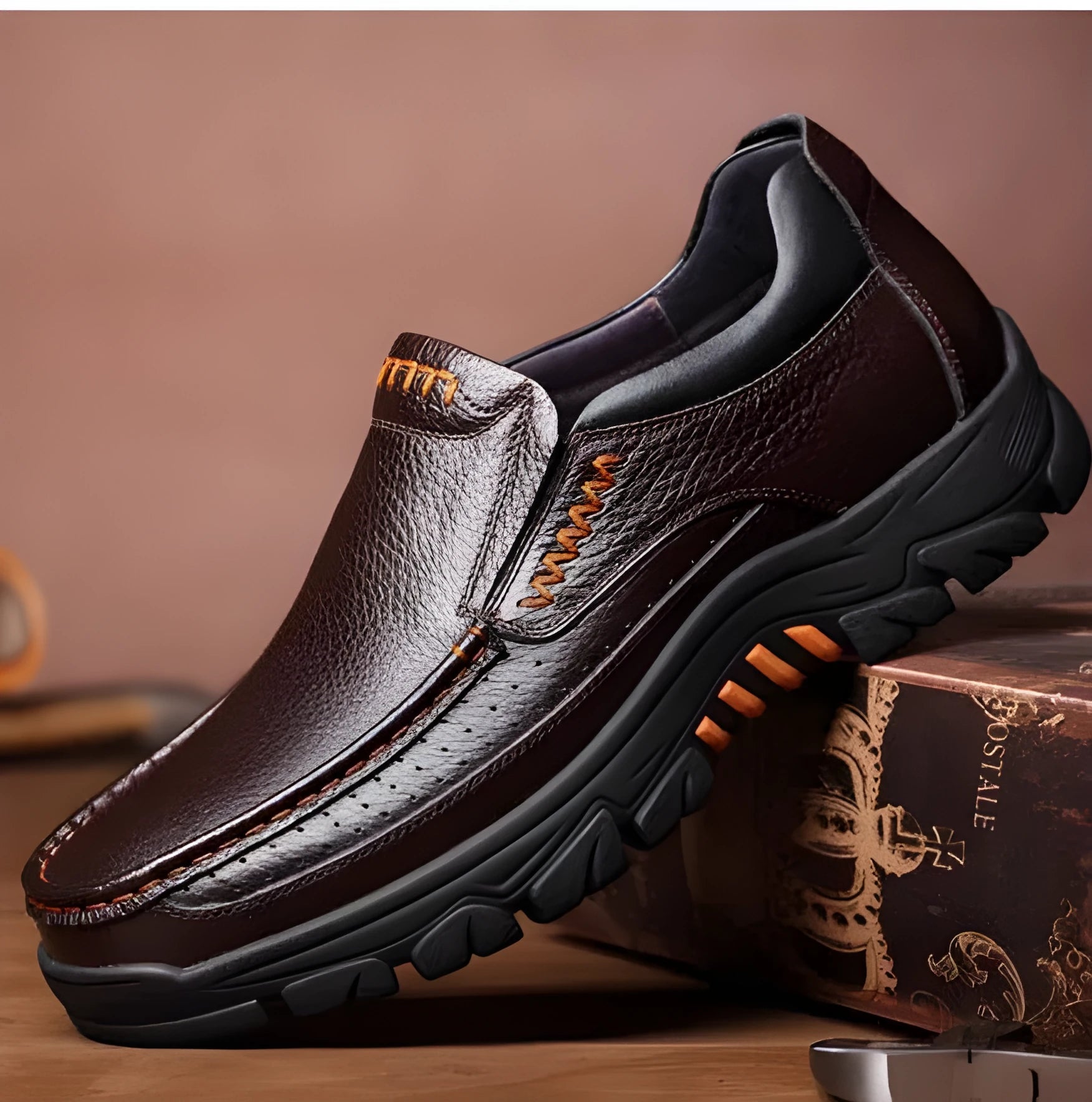 Men's black cowhide leather slip-on business casual shoes with a rubber sole.