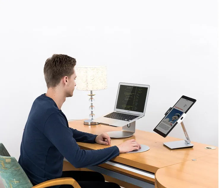 Silver folding aluminium desktop phone and tablet stand with 360° rotating base