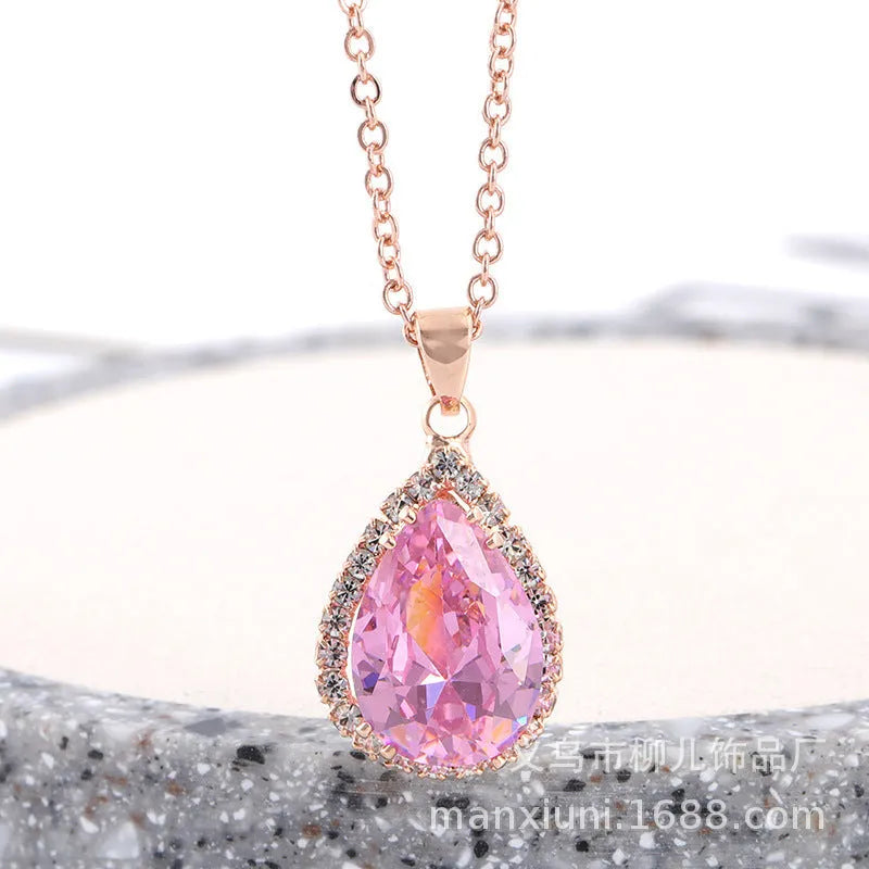 Drop shape geometric pendant necklace with rhinestone inlay in pink rose gold electroplated finish
