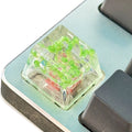 Single resin mechanical keyboard keycap with high transparency and embedded starry sky design, shown in violet colour.
