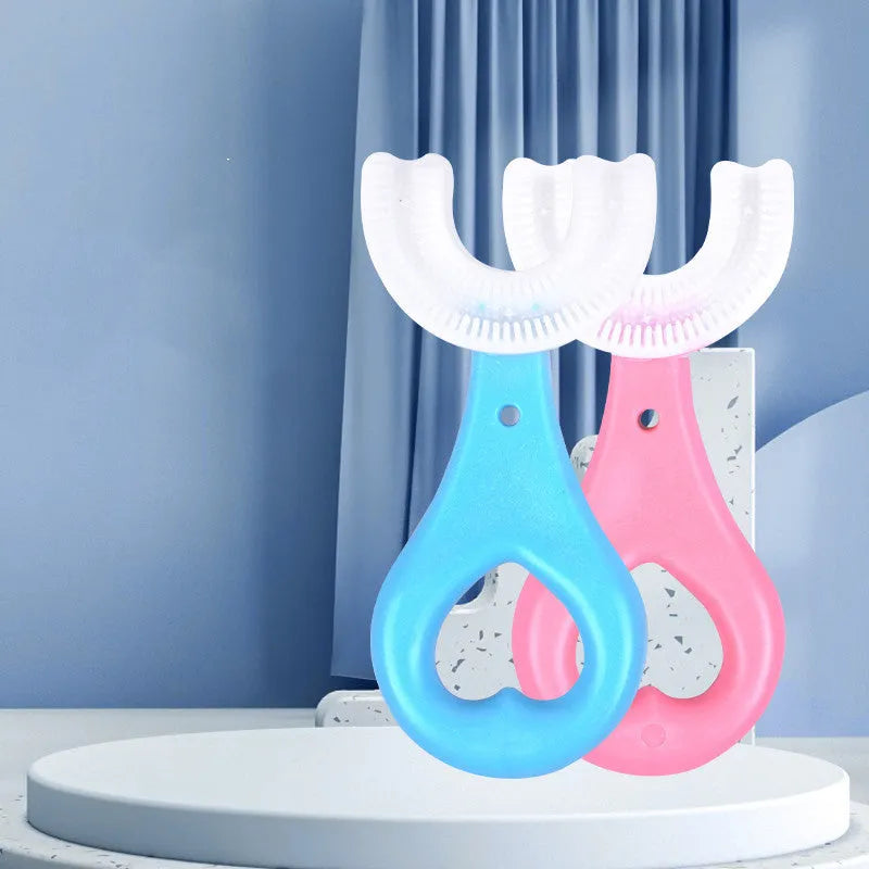 Children's U-shaped soft rubber toothbrush in pink and blue colours for milk teeth cleaning