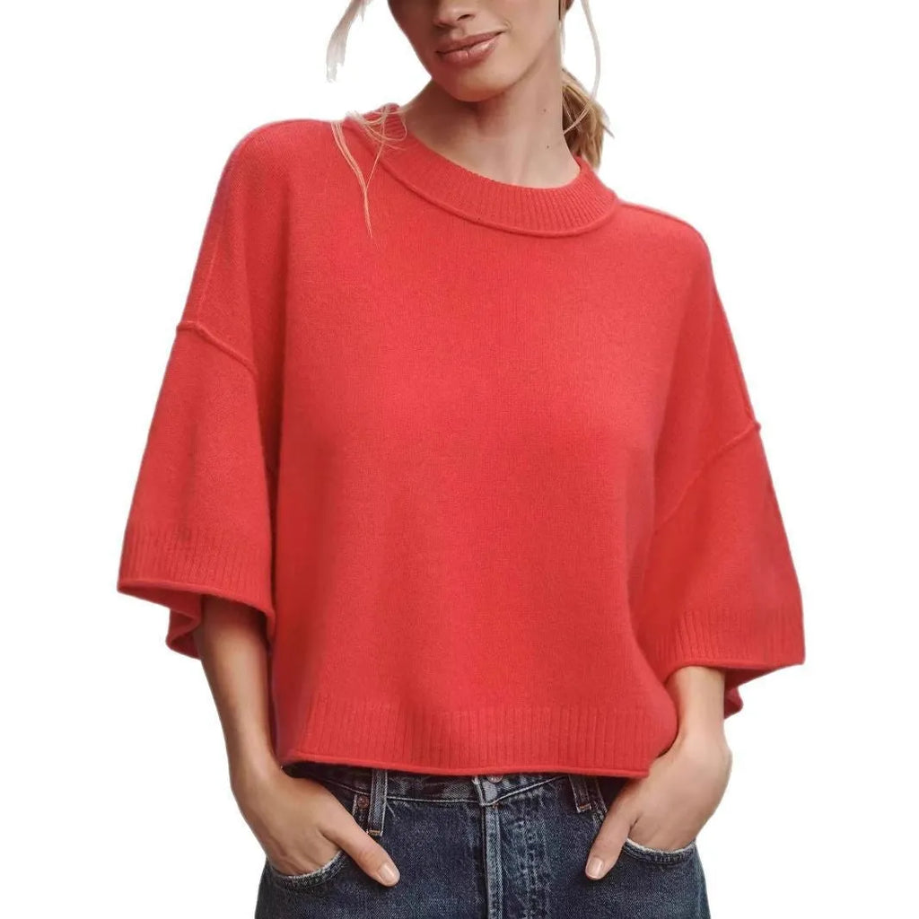 Red short viscose T-shirt with exposed navel styling on a mannequin.