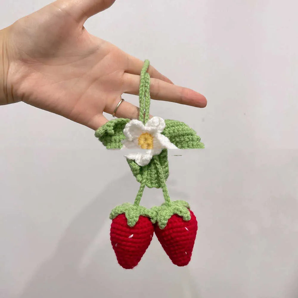 Handmade knitted strawberry shaped car hanging ornament made from cotton and hemp fibres