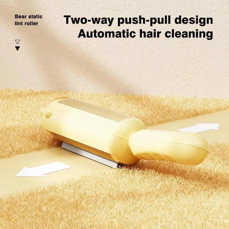 Blue reusable pet hair remover roller with a self-cleaning base on a fabric sofa.