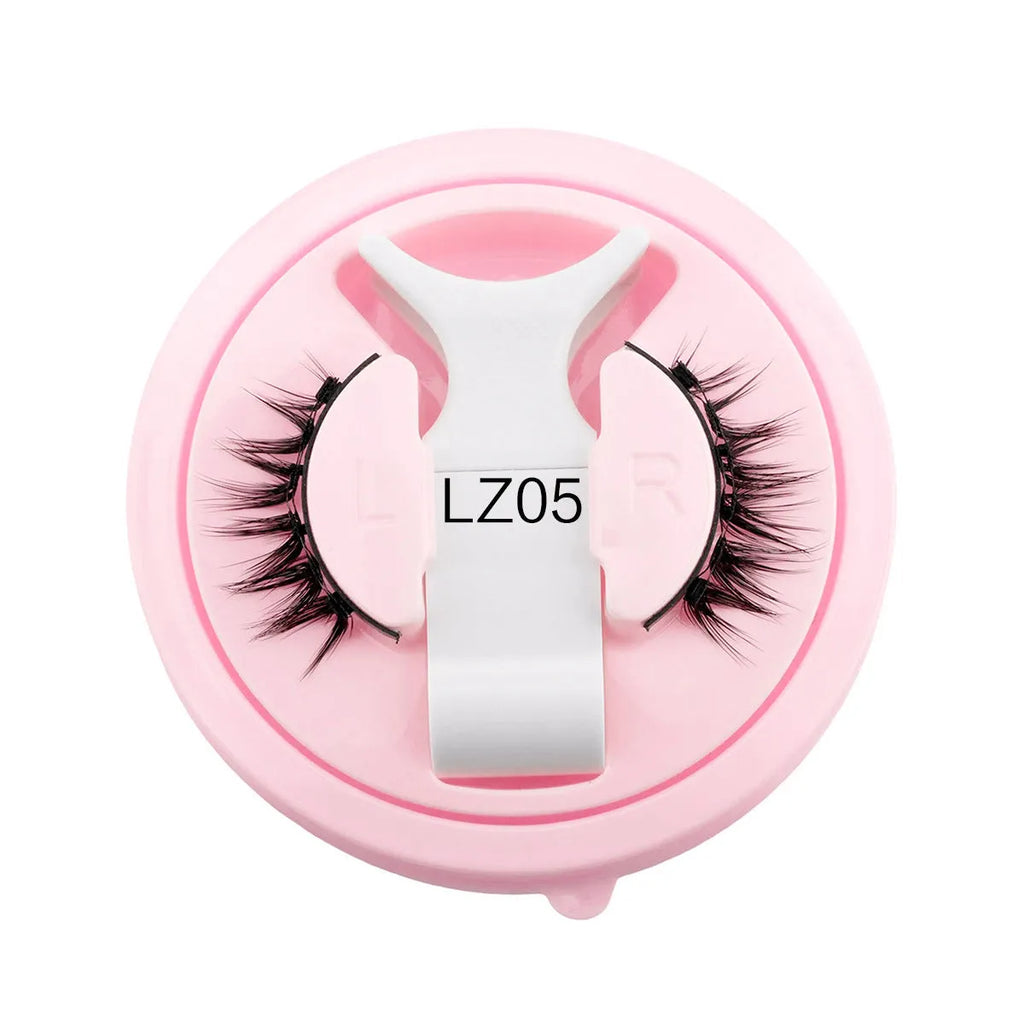 Reusable waterproof false eyelashes in a set, showing thick artificial fibre lashes.