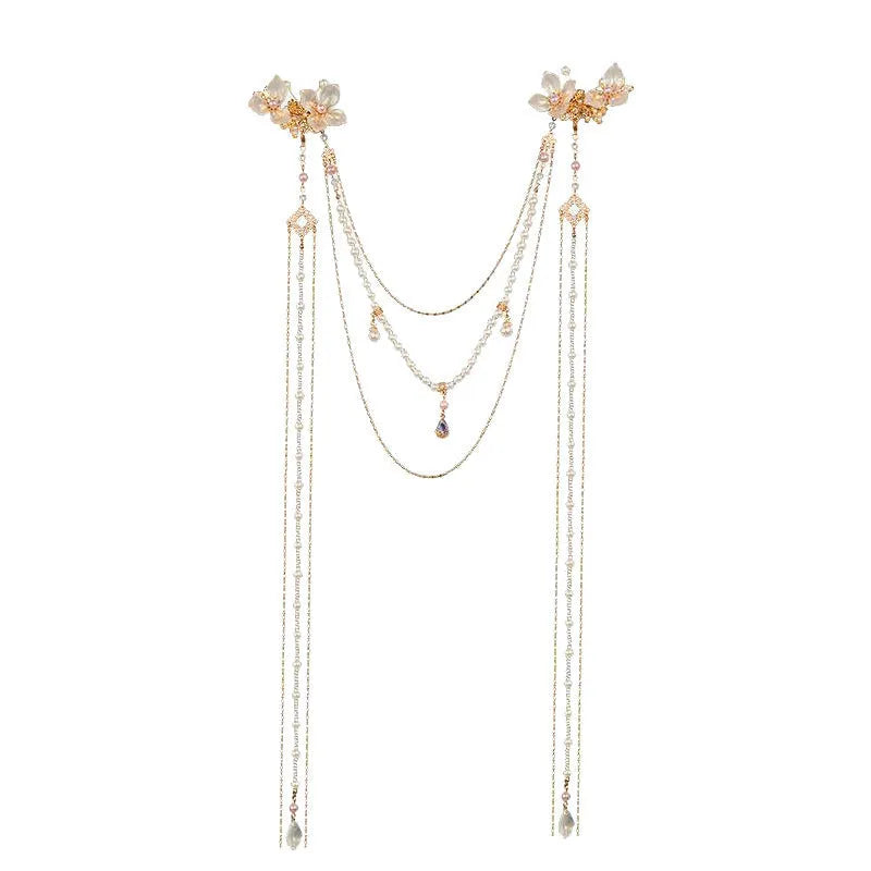 Gold women's hairpin with a pearl diamond flower and a long tassel.