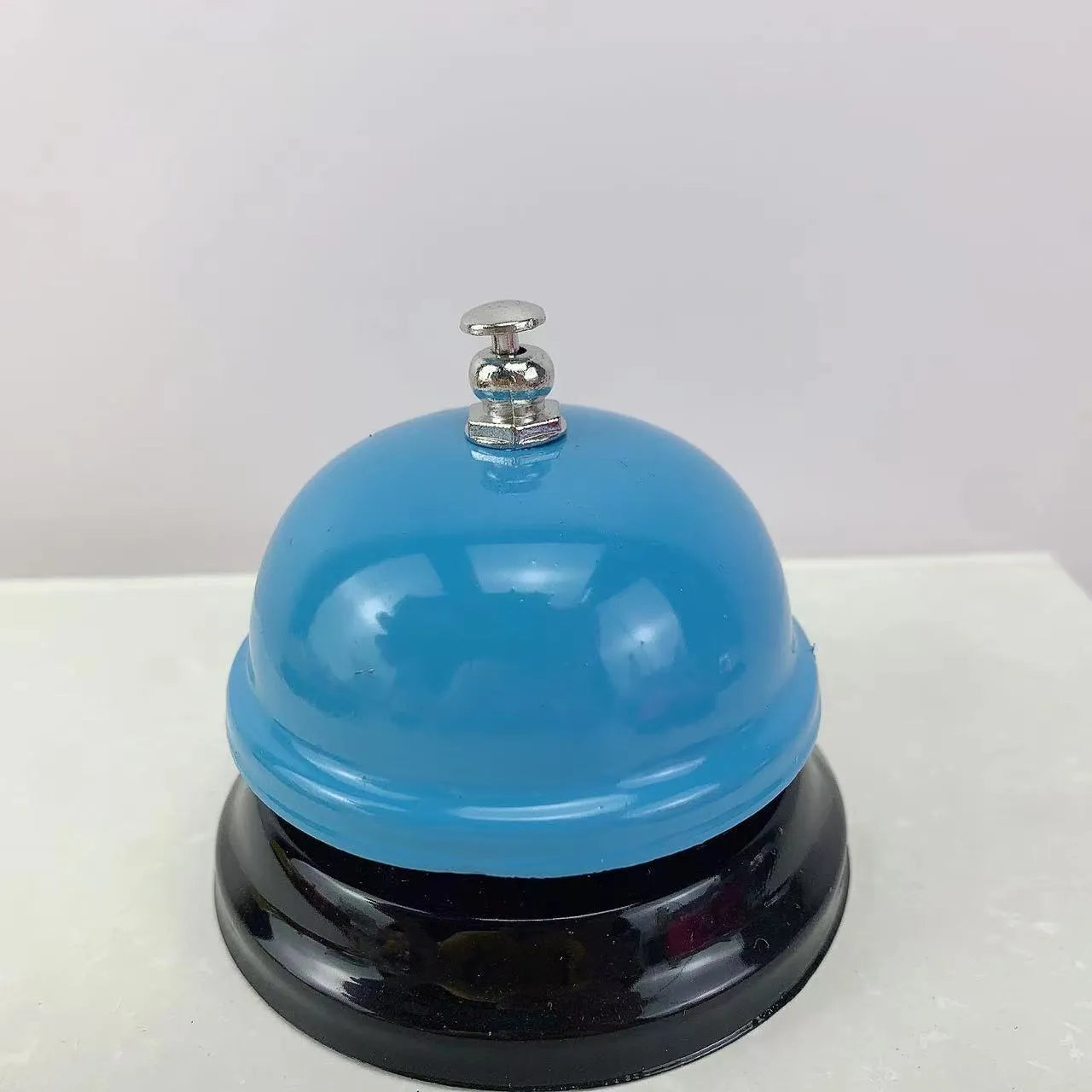 Iron game bell in various colours for classroom and restaurant use