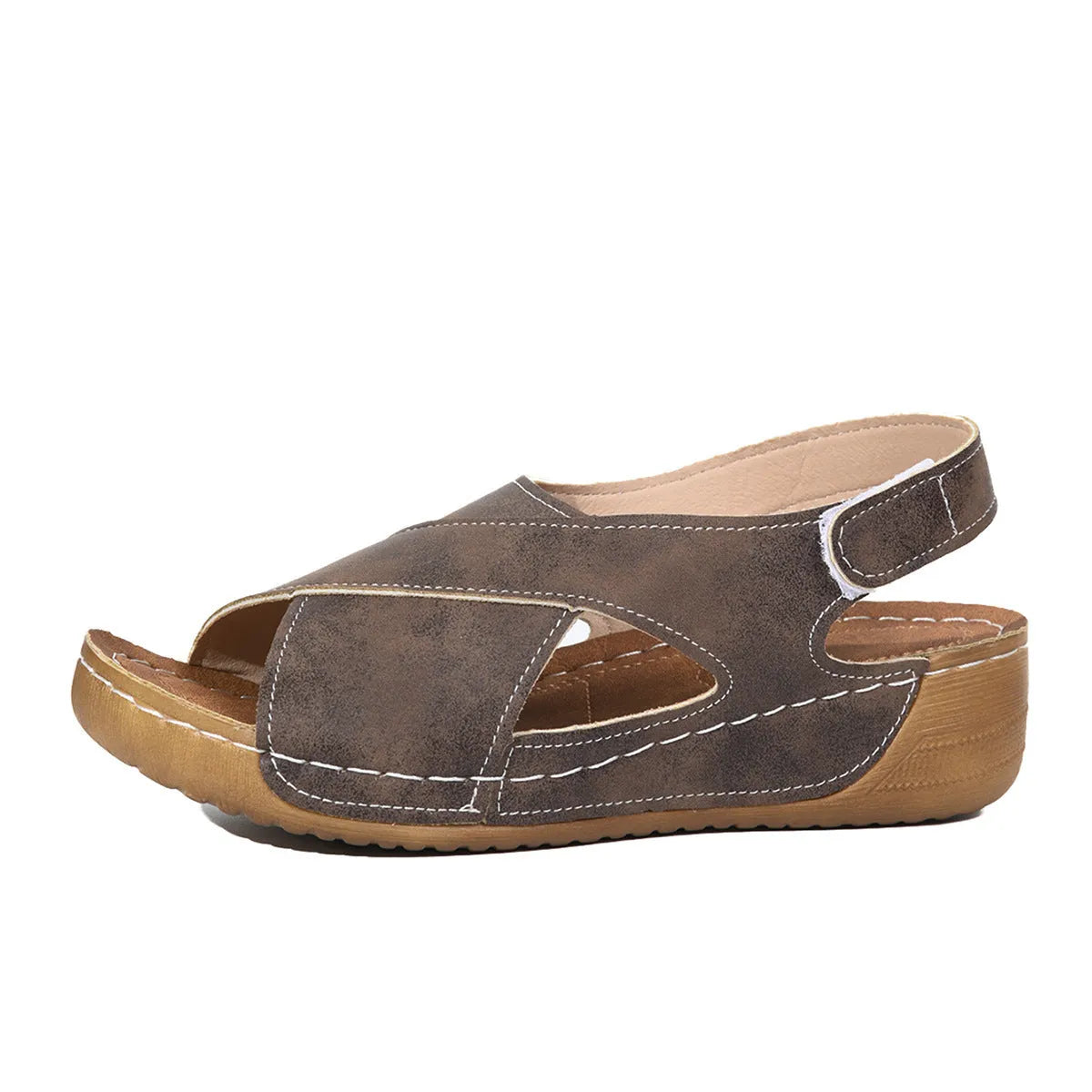 Roman-style women's platform sandals with an open toe and an adjustable Velcro ankle strap.