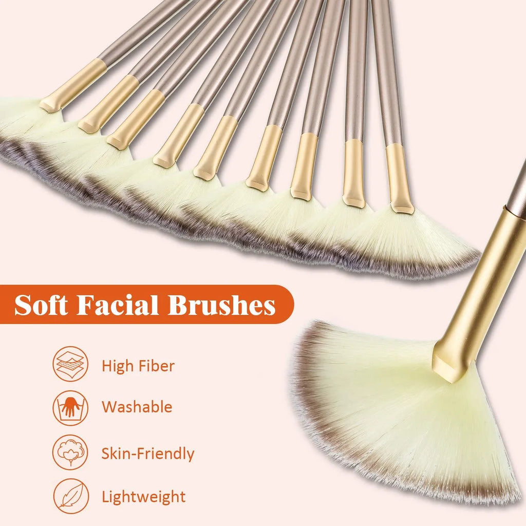 Ten champagne-coloured facial fan brushes with acrylic handles and protective covers laid out.