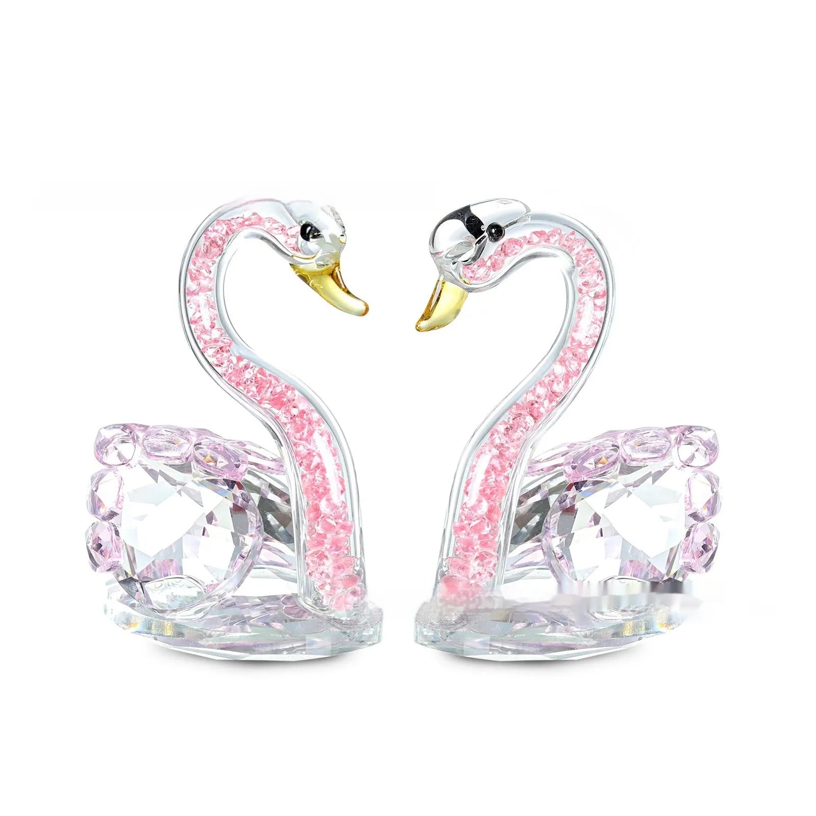 White crystal swan decoration on desktop with red, blue, pink, and violet colour options