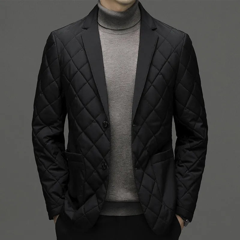 Man wearing a solid colour thickened lapel down jacket with side seam pockets.