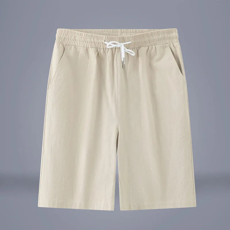 Cotton and linen cropped trousers with drawstring waist in solid colour on hanger