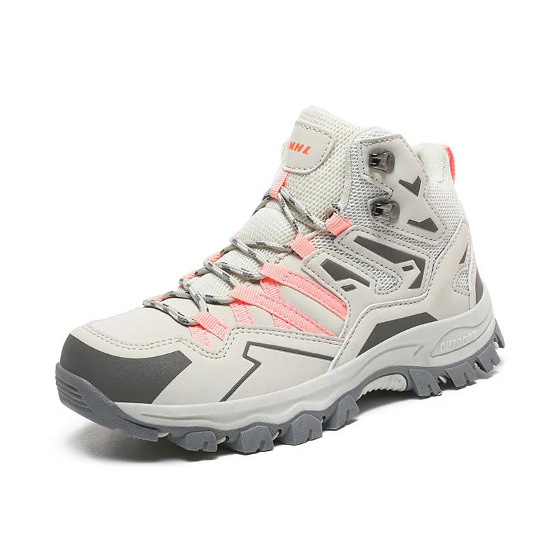 A pair of low-top hiking sneakers with a lace-up front, shown in a colour option like grey or purple.