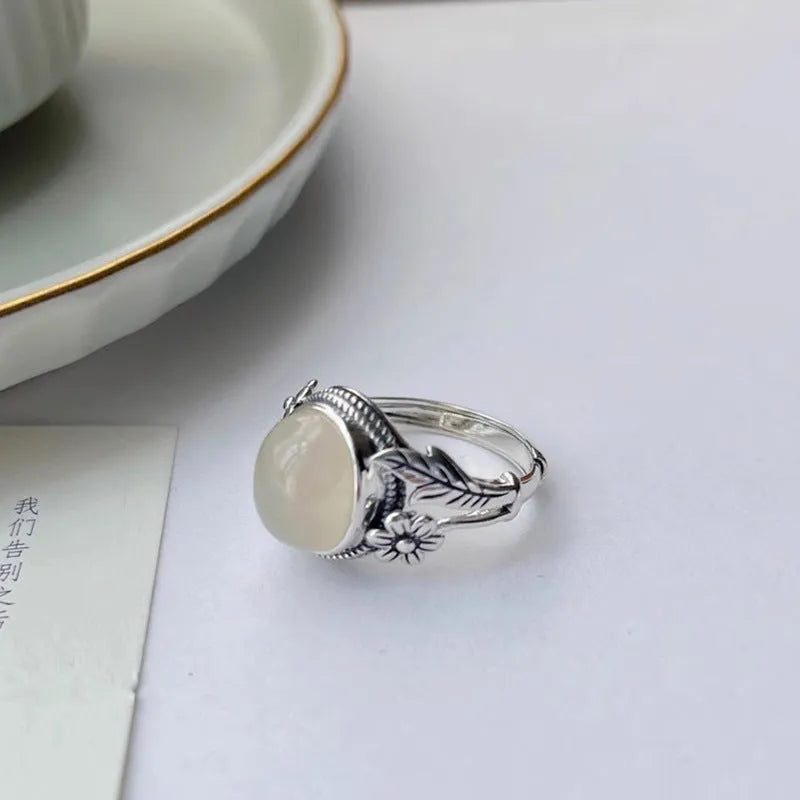 Adjustable copper vintage ring with U-shaped open mouth design and imitation white chalcedony stone