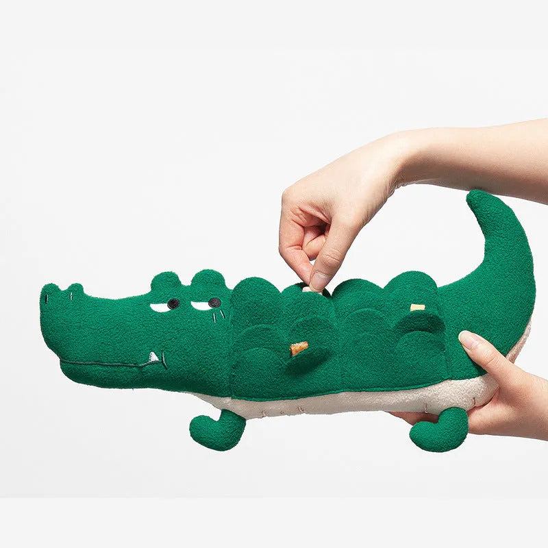 Green plush toy dog measuring 35cm long by 18cm wide