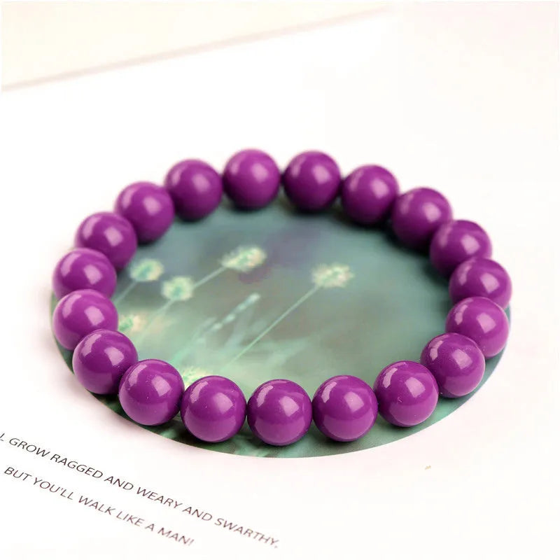 Jiuya purple mica crystal bracelet in 5A grade on a wrist.