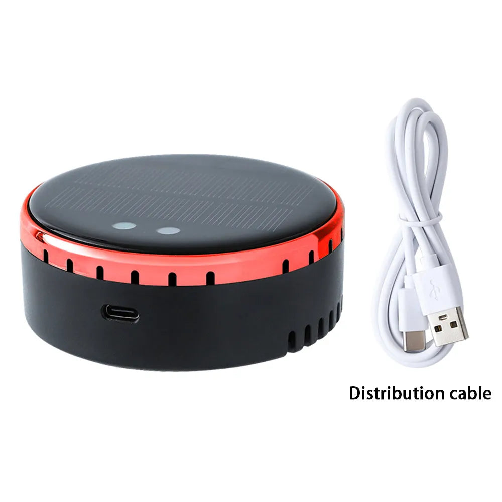 Black solar-powered car air humidifier mounted in a vehicle air conditioning vent
