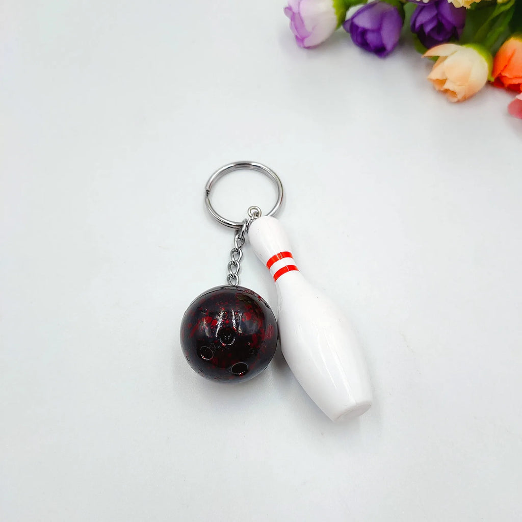 Mini bowling ball keychain pendant in blue colour with metal ring