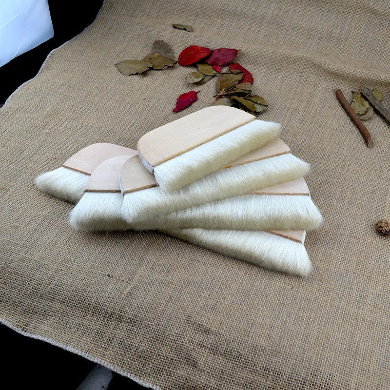 Natural wool brush for art mounting and board shading, shown in picture colour