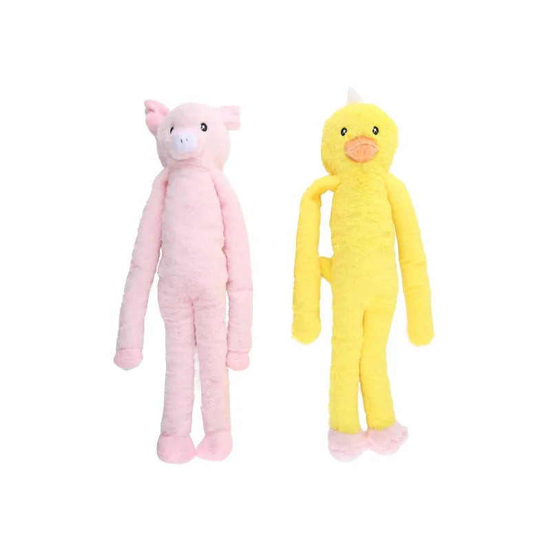 Large pink and yellow plush dog toy with rattle and paper sound elements for golden retrievers